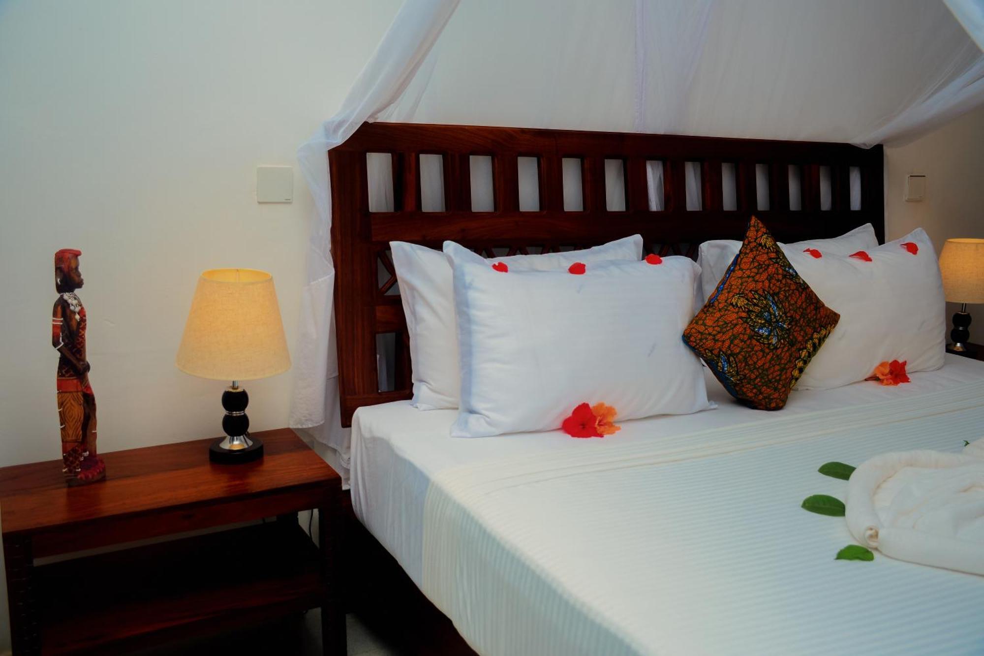 Manolo Beach Resort Ероа Экстерьер фото