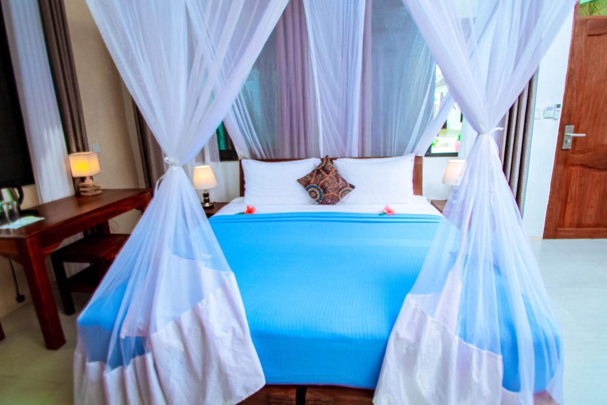 Manolo Beach Resort Ероа Экстерьер фото